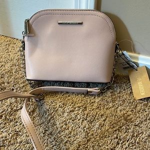 Steve Madden pink purse never used! Tags on it